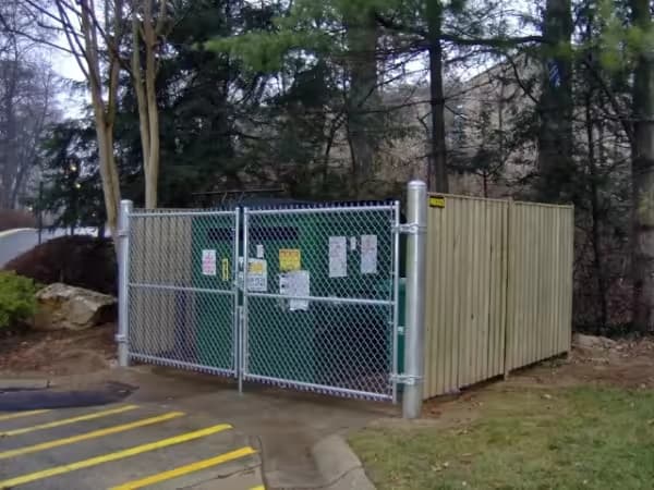 DIY Tips for Building and Decorating a Dumpster Enclosure to Enhance Your Business Space